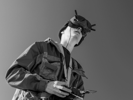 LoggedFlightTime_ImageOnly A young girl piloting a robot